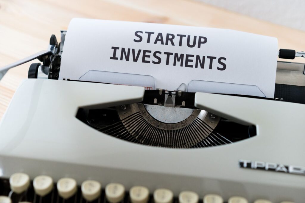 pexels-photo-4584836-4584836 A vintage typewriter displaying a page with the words 'Startup Investments,' ideal for business and entrepreneurship themes.