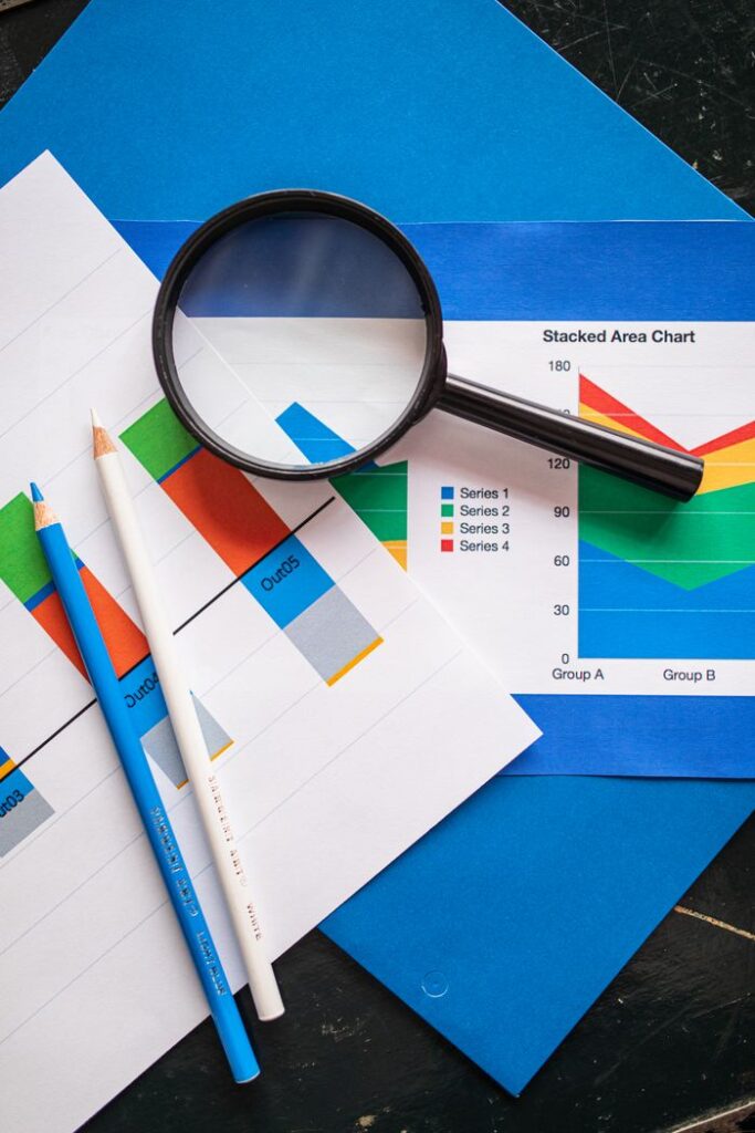 pexels-photo-7948039-7948039 Image of financial charts and magnifying glass, ideal for business insights.